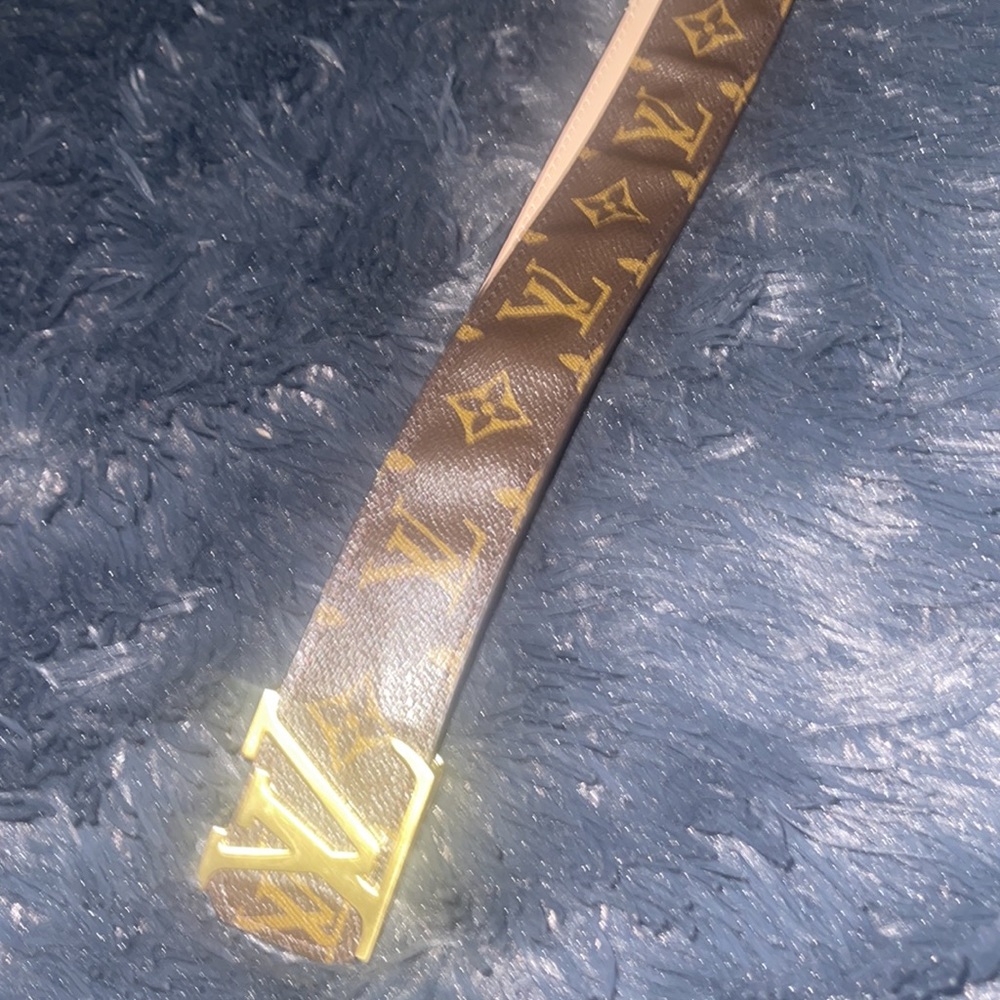 It’s a brown leather Louis Vuitton Belt…Bought for my mans & he didn’t like it. - Picture 4 of 4